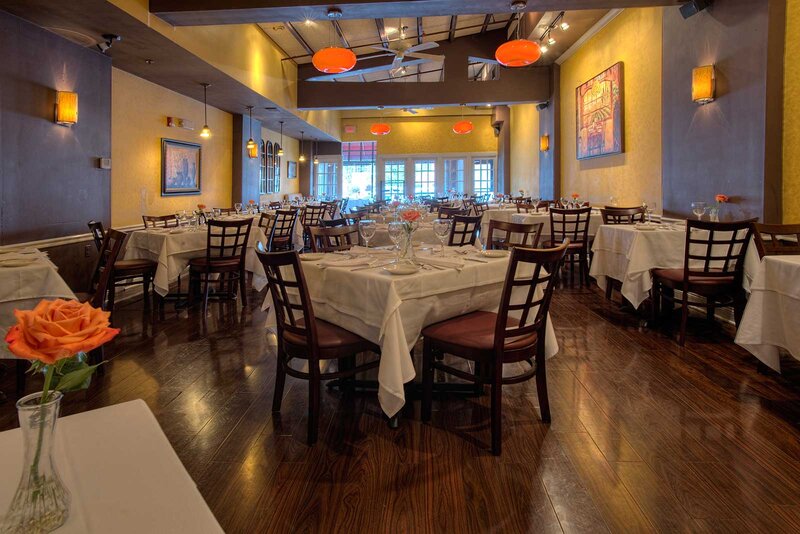 Dining room with many set tables